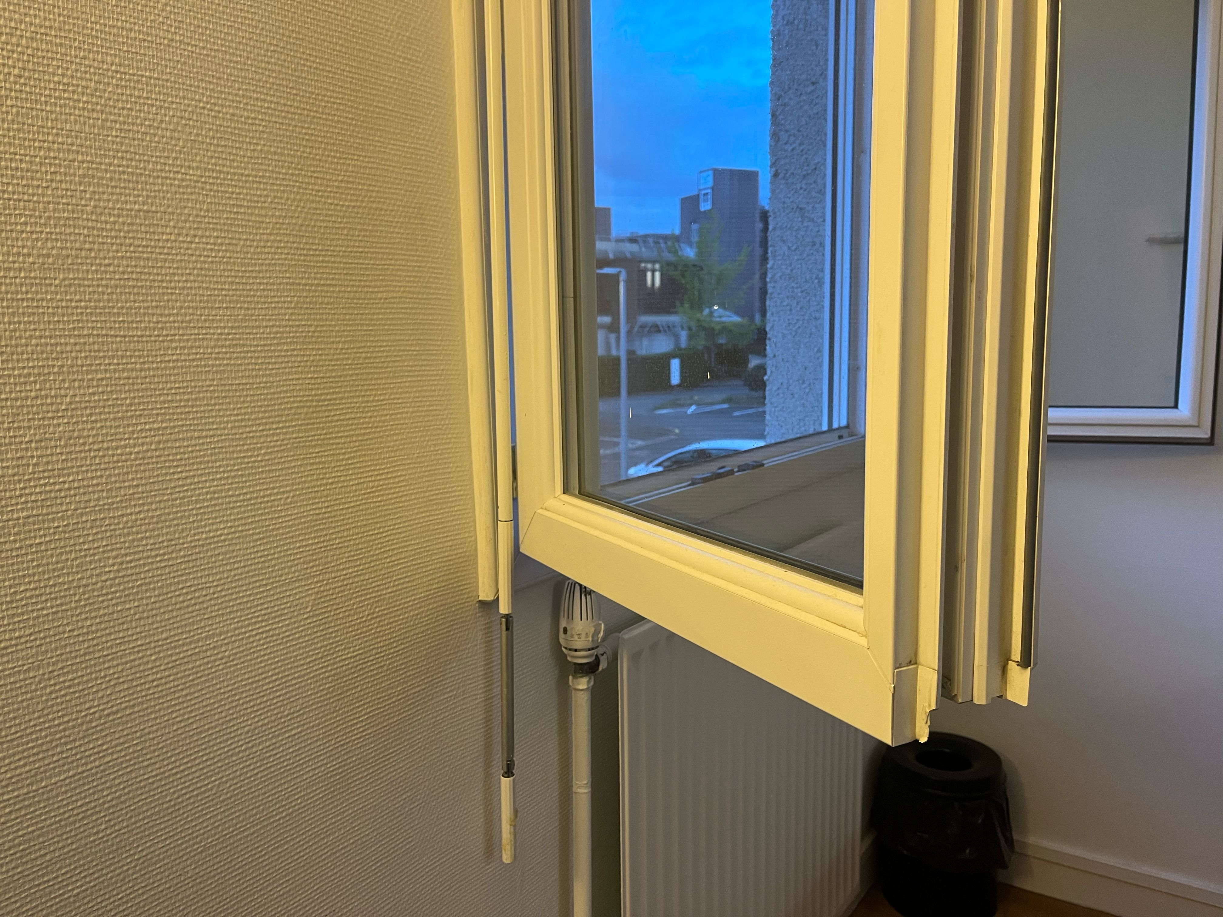 A window that fails to fully open due to bad design